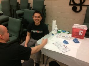 PA Student Jimmy Hoang helping deliver the mental health patient education curriculum at ISU