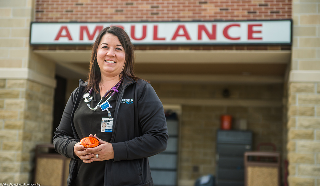 PA Afton Heitzenrater in front of ambulance bay.